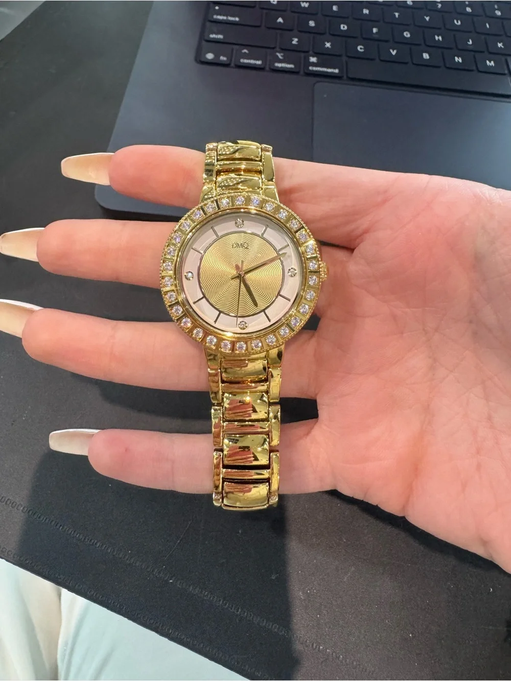 New DMQ Women’s Gold-Tone Round Dress Watch w/ Swirl Dial, Crystal Bezel